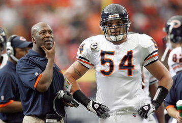 ATLANTA - OCTOBER 12:  Brian Urlacher #54 of the Chicago Bears listens to head coach Lovie Smith during the game against the Atlanta Falcons at the Georgia Dome on October 12, 2008 in Atlanta, Georgia.  (Photo by Kevin C. Cox/Getty Images)