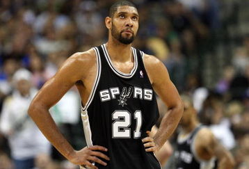 DALLAS - APRIL 25:  Forward Tim Duncan #21 of the San Antonio Spurs during play against the Dallas Mavericks in Game Four of the Western Conference Quarterfinals during the 2009 NBA Playoffs at American Airlines Center on April 25, 2009 in Dallas, Texas. NOTE TO USER: User expressly acknowledges and agrees that, by downloading and or using this photograph, User is consenting to the terms and conditions of the Getty Images License Agreement.  (Photo by Ronald Martinez/Getty Images)