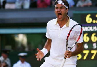 WIMBLEDON, ENGLAND - JULY 05:  Roger Federer of Switzerland celebrates victory during the men's singles final match against Andy Roddick of USA on Day Thirteen of the Wimbledon Lawn Tennis Championships at the All England Lawn Tennis and Croquet Club on July 5, 2009 in London, England. Federer won 5-7, 7-6, 7-6, 3-6, 16-14.  (Photo by Clive Brunskill/Getty Images)