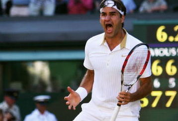 WIMBLEDON, ENGLAND - JULY 05:  Roger Federer of Switzerland celebrates victory during the men's singles final match against Andy Roddick of USA on Day Thirteen of the Wimbledon Lawn Tennis Championships at the All England Lawn Tennis and Croquet Club on July 5, 2009 in London, England. Federer won 5-7, 7-6, 7-6, 3-6, 16-14.  (Photo by Clive Brunskill/Getty Images)