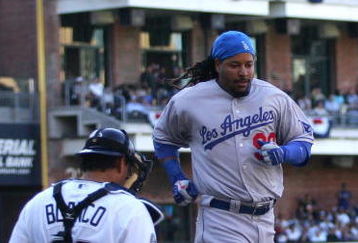 SAN DIEGO, CA- APRIL 6:  Manny Ramirez #99 of the Los Angeles Dodgers scores against the San Diego Padres during their Opening Day game on April 6, 2009 at Petco Park in San Diego, California. (Photo by Donald Miralle/Getty Images)