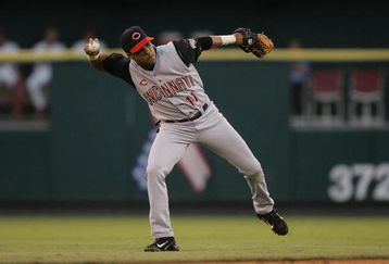 ST. LOUIS - JUNE 18:  Infielder Barry Larkin #11 of the Cincinnati Reds throws the ball against the St. Louis Cardinals during the game at Busch Stadium on June 18, 2004 in St. Louis, Missouri.  The Cardinals defeated the Reds 4-3.  (Photo by Dilip Vishwanat/Getty Images)