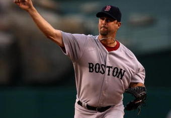 ANAHEIM, CA - MAY 13:  Pitcher Tim Wakefield #49 of the Boston Red Sox throws a pitch against the Los Angeles Angels of Anaheim on May 13, 2009 at Angel Stadium in Anaheim, California.   (Photo by Stephen Dunn/Getty Images)