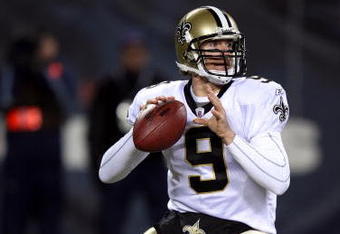CHICAGO - DECEMBER 11:  Drew Brees #9 of the New Orleans Saints drops back to pass against the Chicago Bears at Soldier Field on December 11, 2008 in Chicago, Illinois.  (Photo by Jonathan Daniel/Getty Images)