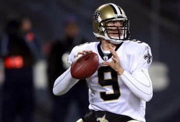 CHICAGO - DECEMBER 11:  Drew Brees #9 of the New Orleans Saints drops back to pass against the Chicago Bears at Soldier Field on December 11, 2008 in Chicago, Illinois.  (Photo by Jonathan Daniel/Getty Images)