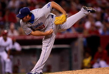 ANAHEIM, CA - JUNE 21:  Closer Jonathan Broxton #51 of the Los Angeles Dodgers throws a pitch on the way to his 17th save against the Los Angeles Angels of Anaheim on June 21, 2009 at Angel Stadium in Anaheim, California.   The Dodgers won 5-3.  (Photo by Stephen Dunn/Getty Images)