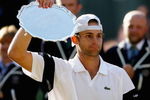 WIMBLEDON, ENGLAND - JULY 05:  Andy Roddick of USA looks despondent after defeat during the men's singles final match against Roger Federer of Switzerland on Day Thirteen of the Wimbledon Lawn Tennis Championships at the All England Lawn Tennis and Croquet Club on July 5, 2009 in London, England. Federer won 5-7, 7-6, 7-6, 3-6, 16-14.  (Photo by Paul Gilham/Getty Images)