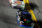 DAYTONA BEACH, FL - JULY 04:  Denny Hamlin, driver of the #11 FedEx Office Toyota, leads Tony Stewart, driver of the #14 Burger King Chevrolet,  Kyle Busch, driver of the #18 Interstate Batteries Toyota, during the NASCAR Sprint Cup Series 51st Annual Coke Zero 400 at Daytona International Speedway on July 4, 2009 in Daytona Beach, Florida.  (Photo by Sam Greenwood/Getty Images)
