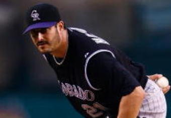 ANAHEIM, CA - JUNE 24:  Jason Marquis #21 of the Colorado Rockies pitches against the Los Angeles Angels of Anaheim at Angel Stadium on June 24, 2009 in Anaheim, California.  (Photo by Jeff Gross/Getty Images)