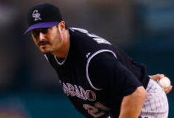 ANAHEIM, CA - JUNE 24:  Jason Marquis #21 of the Colorado Rockies pitches against the Los Angeles Angels of Anaheim at Angel Stadium on June 24, 2009 in Anaheim, California.  (Photo by Jeff Gross/Getty Images)