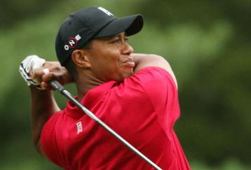 BETHESDA, MD - JULY 5 : Tiger Woods hits his tee shot on the 16th hole during the final round of the AT&T National hosted by Tiger Woods at Congressional Country Club on July 5, 2009 in Bethesda, Maryland. (Photo by Hunter Martin/Getty Images)