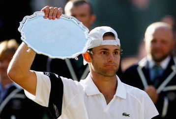 WIMBLEDON, ENGLAND - JULY 05:  Andy Roddick of USA looks despondent after defeat during the men's singles final match against Roger Federer of Switzerland on Day Thirteen of the Wimbledon Lawn Tennis Championships at the All England Lawn Tennis and Croquet Club on July 5, 2009 in London, England. Federer won 5-7, 7-6, 7-6, 3-6, 16-14.  (Photo by Paul Gilham/Getty Images)