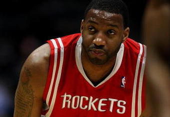 MILWAUKEE - FEBRUARY 09: Tracy McGrady #1 of the Houston Rockets watches as a teammate shoots a free-throw against the Milwaukee Bucks on February 9, 2009 at the Bradley Center in Milwaukee, Wisconsin. The Bucks defeated the Rockets 124-112. NOTE TO USER: User expressly acknowledges and agreees that, by downloading and/or using this Photograph, User is consenting to the terms and conditions of the Getty Images License Agreement. (Photo by Jonathan Daniel/Getty Images)