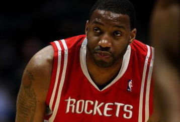 MILWAUKEE - FEBRUARY 09: Tracy McGrady #1 of the Houston Rockets watches as a teammate shoots a free-throw against the Milwaukee Bucks on February 9, 2009 at the Bradley Center in Milwaukee, Wisconsin. The Bucks defeated the Rockets 124-112. NOTE TO USER: User expressly acknowledges and agreees that, by downloading and/or using this Photograph, User is consenting to the terms and conditions of the Getty Images License Agreement. (Photo by Jonathan Daniel/Getty Images)