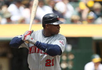 OAKLAND, CA - JUNE 11: Delmon Young #21 of the Minnesota Twins bats against the Oakland Athletics during a Major League Baseball game on June 11, 2009 at the Oakland Coliseum in Oakland, California.  (Photo by Jed Jacobsohn/Getty Images)