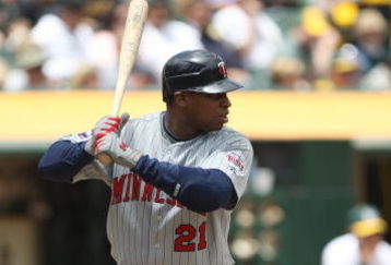 OAKLAND, CA - JUNE 11: Delmon Young #21 of the Minnesota Twins bats against the Oakland Athletics during a Major League Baseball game on June 11, 2009 at the Oakland Coliseum in Oakland, California.  (Photo by Jed Jacobsohn/Getty Images)