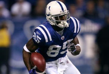 INDIANAPOLIS - NOVEMBER 02:  Pierre Garcon #85 of the Indianapolis Colts returns the ball against the New England Patriots at Lucas Oil Stadium on November 2, 2008 in Indianapolis, Indiana.  (Photo by Andy Lyons/Getty Images)
