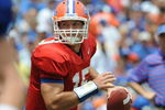 GAINESVILLE, FL - APRIL 18: Quarterback Tim Tebow #15 of the University of Florida passes upfield during the spring football Orange and Blue game April 18, 2009 at Ben Hill Griffin Stadium in Gainesville, Florida.  (Photo by Al Messerschmidt/Getty Images)