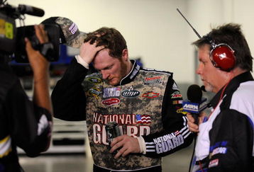 DAYTONA BEACH, FL - JULY 04: Dale Earnhardt Jr, driver of the #88 National Guard/AMP Energy Chevrolet, speaks to the media in the garage after wrecking his car during the NASCAR Sprint Cup Series 51st Annual Coke Zero 400 at Daytona International Speedway on July 4, 2009 in Daytona Beach, Florida.  (Photo by Rusty Jarrett/Getty Images for NASCAR)