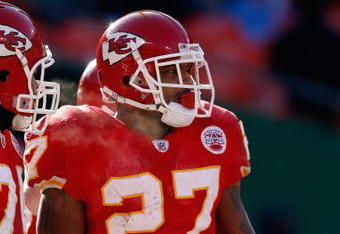 KANSAS CITY, MO - DECEMBER 21:  Larry Johnson #27 of the Kansas City Chiefs looks on during the game against the Miami Dolphins on December 21, 2008 at Arrowhead Stadium in Kansas City, Missouri. (Photo by Jamie Squire/Getty Images)