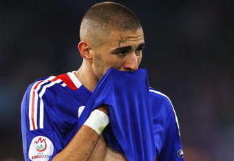 ZURICH, SWITZERLAND - JUNE 17:  Karim Benzema of France looks dejected after defeat in the UEFA EURO 2008 Group C match between France and Italy at Letzigrund Stadion on June 17, 2008 in Zurich, Switzerland.  (Photo by Bryn Lennon/Getty Images)