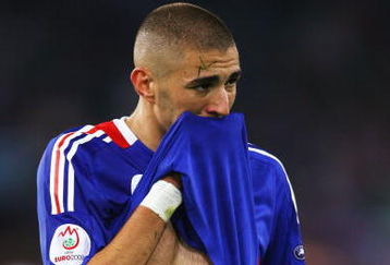 ZURICH, SWITZERLAND - JUNE 17:  Karim Benzema of France looks dejected after defeat in the UEFA EURO 2008 Group C match between France and Italy at Letzigrund Stadion on June 17, 2008 in Zurich, Switzerland.  (Photo by Bryn Lennon/Getty Images)