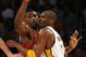 LOS ANGELES, CA - MAY 17:  Kobe Bryant #24 of the Los Angeles Lakers is covered by Ron Artest #96 of the Houston Rockets in the third quarter of Game Seven of the Western Conference Semifinals during the 2009 NBA Playoffs at Staples Center on May 17, 2009 in Los Angeles, California. NOTE TO USER: User expressly acknowledges and agrees that, by downloading and or using this photograph, User is consenting to the terms and conditions of the Getty Images License Agreement.  (Photo by Stephen Dunn/Getty Images)