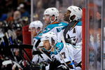 ANAHEIM, CA - APRIL 23:  Joe Pavelski #8, Patrick Marleau #12, Brad Lukowich #37 andMike Grier #25 of the San Jose Sharks look on from the bench area in the third period en route to a 4-0 loss to the Anaheim Ducks during Game Four of the Western Conference Quarterfinal Round of the 2009 Stanley Cup Playoffs at Honda Center on April 23, 2009 in Anaheim, California.  (Photo by Kevork Djansezian/Getty Images)