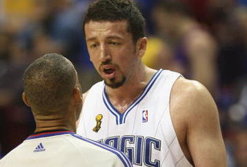 ORLANDO, FL - JUNE 14:  Hedo Turkoglu #15 of the Orlando Magic talks with referee Dan Crawford #43 during Game Five of the 2009 NBA Finals against the Los Angeles Lakers on June 14, 2009 at Amway Arena in Orlando, Florida. The Lakers won 99-86. NOTE TO USER:  User expressly acknowledges and agrees that, by downloading and or using this photograph, User is consenting to the terms and conditions of the Getty Images License Agreement. (Photo by Elsa/Getty Images) 