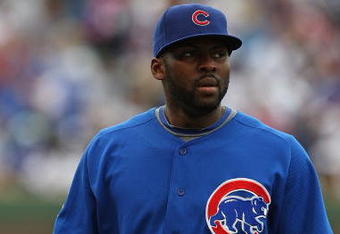 CHICAGO - MAY 27: Milton Bradlery #21 of the Chicago Cubs warms-up before a game against the Pittsburgh Pirates on May 27, 2009 at Wrigley Field in Chicago, Illinois. The Cubs defeated the Pirates 5-2.  (Photo by Jonathan Daniel/Getty Images)