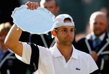 WIMBLEDON, ENGLAND - JULY 05:  Andy Roddick of USA looks despondent after defeat during the men's singles final match against Roger Federer of Switzerland on Day Thirteen of the Wimbledon Lawn Tennis Championships at the All England Lawn Tennis and Croquet Club on July 5, 2009 in London, England. Federer won 5-7, 7-6, 7-6, 3-6, 16-14.  (Photo by Paul Gilham/Getty Images)