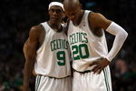 BOSTON - MAY 17:  Rajon Rondo #9 and Ray Allen #20 of the Boston Celtics talk as the Orlando Magic shoot a free throw in Game Seven of the Eastern Conference Semifinals during the 2009 NBA Playoffs at TD Banknorth Garden on May 17, 2009 in Boston, Massachusetts. The Orlando Magic defeated the Boston Celtics 101-82 to advance to the Eastern Conference Finals. NOTE TO USER: User expressly acknowledges and agrees that, by downloading and or using this photograph, User is consenting to the terms and conditions of the Getty Images License Agreement.  (Photo by Elsa/Getty Images)