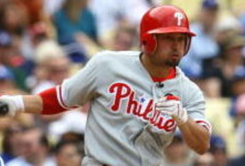 LOS ANGELES, CA - JUNE 06:  Shane Victorino #8 of the Philadelphia Phillies bats against the Los Angeles Dodgers at Dodger Stadium on June 6, 2009 in Los Angeles, California. The Dodgers defeated the Phillies 3-2 in twelve innings.  (Photo by Jeff Gross/Getty Images)