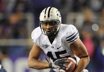 FORT WORTH, TX - OCTOBER 16:  Running back Harvey Unga #45 of the BYU Cougars runs against the TCU Horned Frogs at Amon G. Carter Stadium on October 16, 2008 in Fort Worth, Texas.  (Photo by Ronald Martinez/Getty Images)
