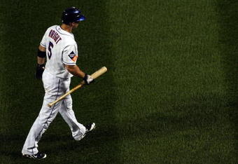 NEW YORK - JUNE 28:  David Wright #5 of the New York Mets walks back to the dugout after striking out against the New York Yankees on June 28, 2009 at Citi Field in the Flushing neighborhood of the Queens borough of New York City.  (Photo by Jim McIsaac/Getty Images)
