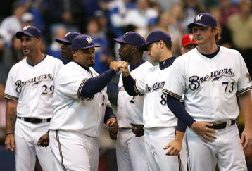 MILWAUKEE - OCTOBER 04:  Prince Fielder #28 of the Milwaukee Brewers greets Ryan Braun #8 during player introductions against the Philadelphia Phillies in Game three of the NLDS during the 2008 MLB playoffs at Miller Park on October 4, 2008 in Milwaukee, Wisconsin.  (Photo by Jim McIsaac/Getty Images)