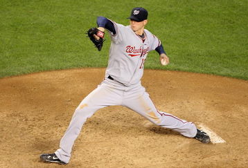 PHOENIX - MAY 10:  Starting pitcher Scott Olsen #19 of the Washington Nationals pitches against the Arizona Diamondbacks during the major league baseball game at Chase Field on May 10, 2009 in Phoenix, Arizona. The Diamondbacks defeated the Nationals 10-8.  (Photo by Christian Petersen/Getty Images)