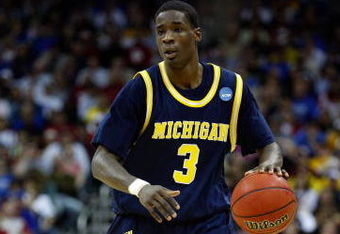 KANSAS CITY, MO - MARCH 21:  Manny Harris #3 of the Michigan Wolverines dribbles the ball against the Oklahoma Sooners during the second round of the NCAA Division I Men's Basketball Tournament at the Sprint Center on March 21, 2009 in Kansas City, Missouri. The Sooners defeated the Wolverines 73-63.  (Photo by Jamie Squire/Getty Images)