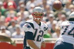 FOXBORO, MA - SEPTEMBER 7:  Quarterback Tom Brady #12 of the New England Patriots passes the ball up the middle during their NFL game against the Kansas City Chiefs on September 7, 2008 at Gillette Stadium in Foxboro, Massachusetts. The Patriots defeated the Chiefs 17-10. (Photo by Elsa Garrison/Getty Images)