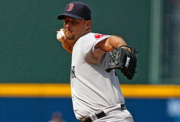 ATLANTA - JUNE 27:  Starting pitcher Tim Wakefield #49 of the Boston Red Sox pitches against the Atlanta Braves at Turner Field on June 27, 2009 in Atlanta, Georgia.  (Photo by Kevin C. Cox/Getty Images)
