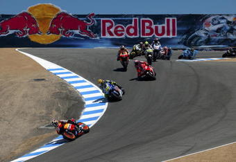 MONTEREY, CA - JULY 5:  Dani Pedrosa of Spain leads the field at the start of the Moto GP Red Bull U. S. Grand Prix at the Mazda Raceway Laguna Seca on July 5, 2009 in Monterey, California.  (Photo by Robert Laberge/Getty Images)