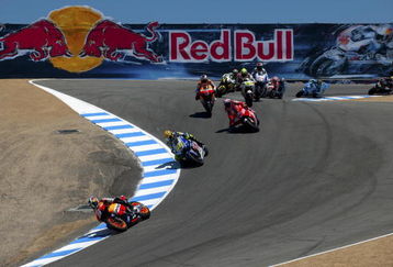MONTEREY, CA - JULY 5:  Dani Pedrosa of Spain leads the field at the start of the Moto GP Red Bull U. S. Grand Prix at the Mazda Raceway Laguna Seca on July 5, 2009 in Monterey, California.  (Photo by Robert Laberge/Getty Images)