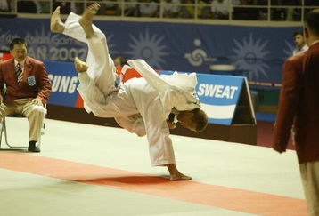 BUSAN, SOUTH KOREA - OCTOBER 1:  Yoshihiro Akiyama in action in the Judo during the14th Asian Games on October 1, 2002 in Busan, South Korea.  (Photo by Aflo/Getty Images).    