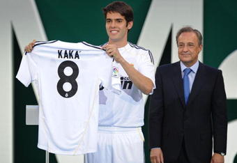 MADRID, SPAIN - JUNE 30:  New signing Kaka (L) presents his new Real Madrid shirt beside club President Florentino Perez during his official presentation as a Real Madrid player at the Santiago Bernabeu Stadium on June 30, 2009 in Madrid, Spain.  (Photo by Denis Doyle/Getty Images)