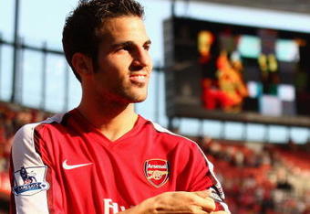 LONDON, ENGLAND - MAY 24:  Cesc Fabregas of Arsenal takes off his captains armband after the Barclays Premier League match between Arsenal and Stoke City at Emirates Stadium on May 24, 2009 in London, England.  (Photo by Ryan Pierse/Getty Images)