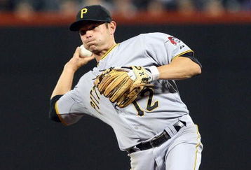 NEW YORK - MAY 08:  Freddy Sanchez #12 of the Pittsburgh Pirates plays the field against the New York Mets on May 8, 2009 at Citi Field in the Flushing neighborhood of the Queens borough of New York City. The Mets defeated the Pirates 7-3.  (Photo by Jim McIsaac/Getty Images)