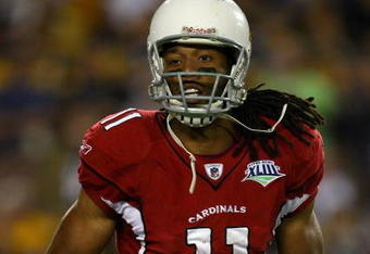 TAMPA, FL - FEBRUARY 01:  Larry Fitzgerald #11 of the Arizona Cardinals catches the ball against the Pittsburgh Steelers during Super Bowl XLIII on February 1, 2009 at Raymond James Stadium in Tampa, Florida.  (Photo by Jamie Squire/Getty Images)