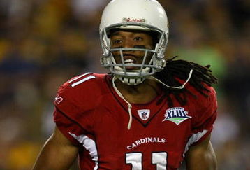 TAMPA, FL - FEBRUARY 01:  Larry Fitzgerald #11 of the Arizona Cardinals catches the ball against the Pittsburgh Steelers during Super Bowl XLIII on February 1, 2009 at Raymond James Stadium in Tampa, Florida.  (Photo by Jamie Squire/Getty Images)