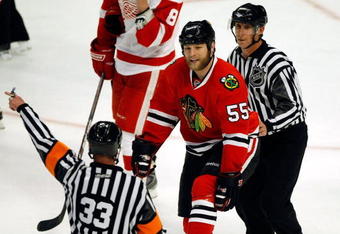 CHICAGO - MAY 24:  Ben Eager #55 of the Chicago Blackhawks is ejected from the game after he was called for a ten minute misconduct in the second period against the Detroit Red Wings during Game Four of the Western Conference Championship Round of the 2009 Stanley Cup Playoffs on May 24, 2009 at the United Center in Chicago, Illinois.  (Photo by Jim Prisching/Getty Images)