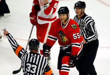 CHICAGO - MAY 24:  Ben Eager #55 of the Chicago Blackhawks is ejected from the game after he was called for a ten minute misconduct in the second period against the Detroit Red Wings during Game Four of the Western Conference Championship Round of the 2009 Stanley Cup Playoffs on May 24, 2009 at the United Center in Chicago, Illinois.  (Photo by Jim Prisching/Getty Images)
